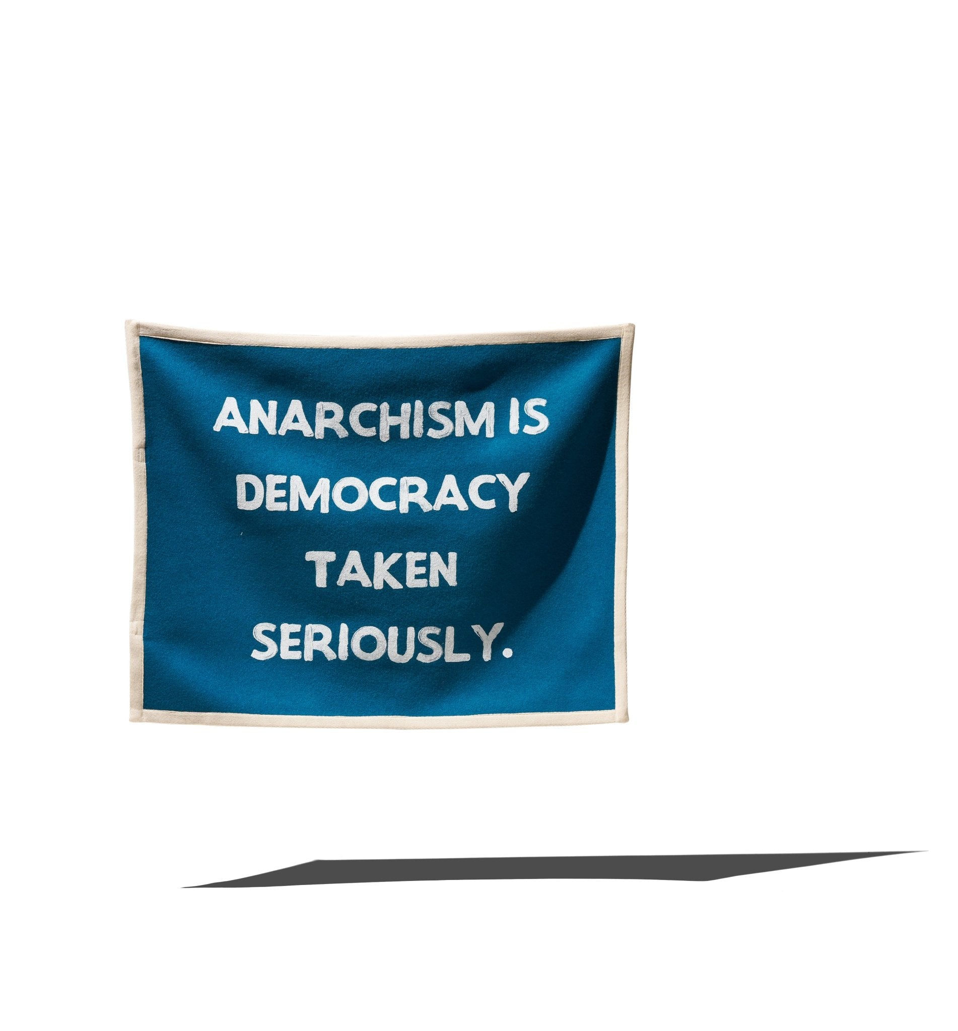 “ANARCHISM IS DEMOCRACY TAKEN SERIOUSLY” FLAG - RADICAL MEDIA ARCHIVE