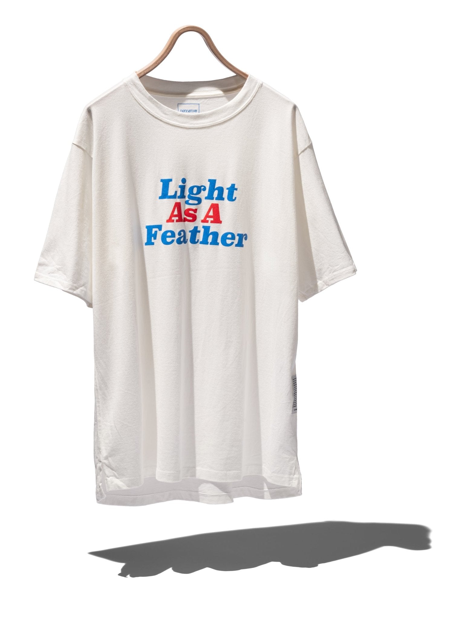 DWELLER S/S TEE "LIGHT AS A FEATHER" - NONNATIVE
