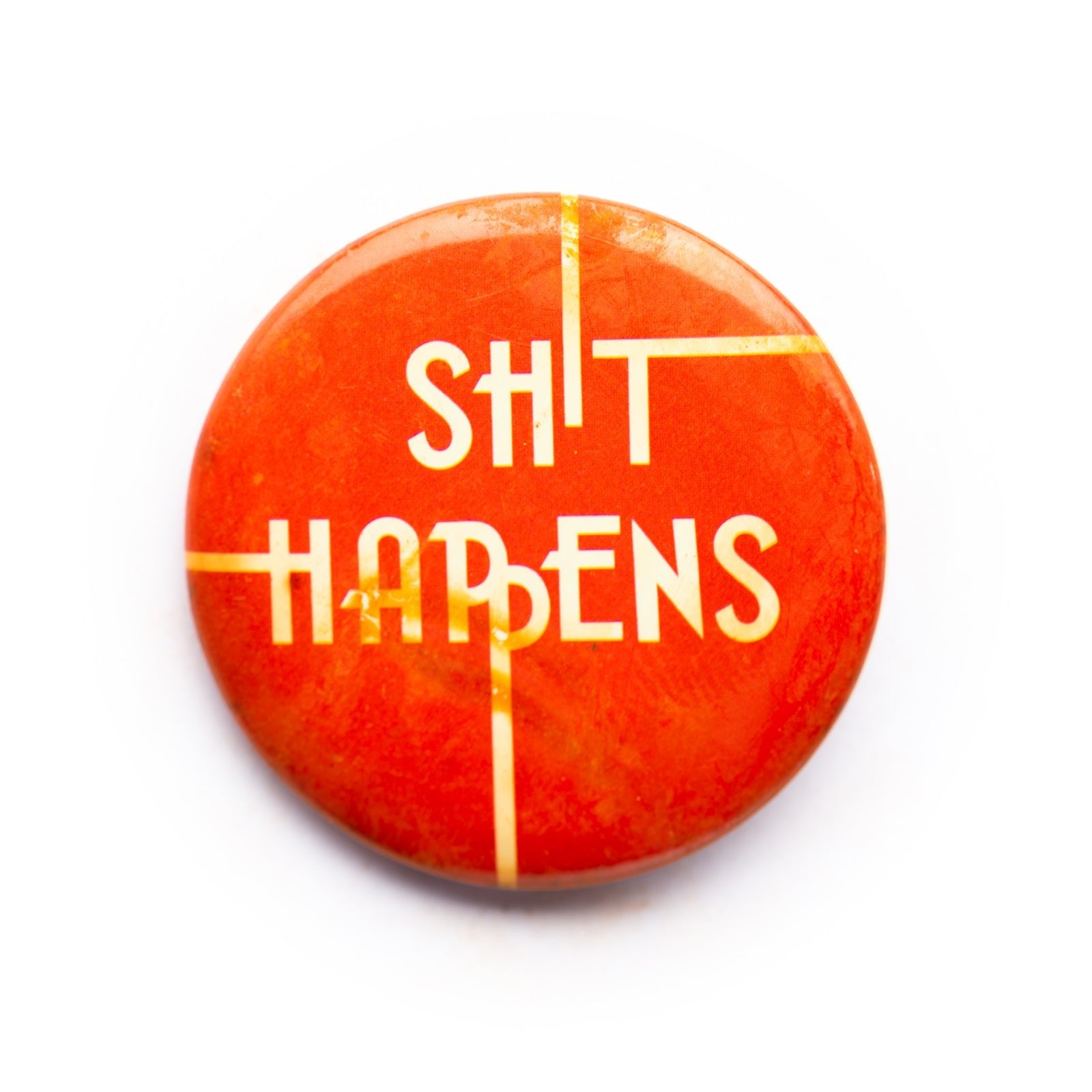 "Sh*t happens" button pin - RADICAL MEDIA ARCHIVE