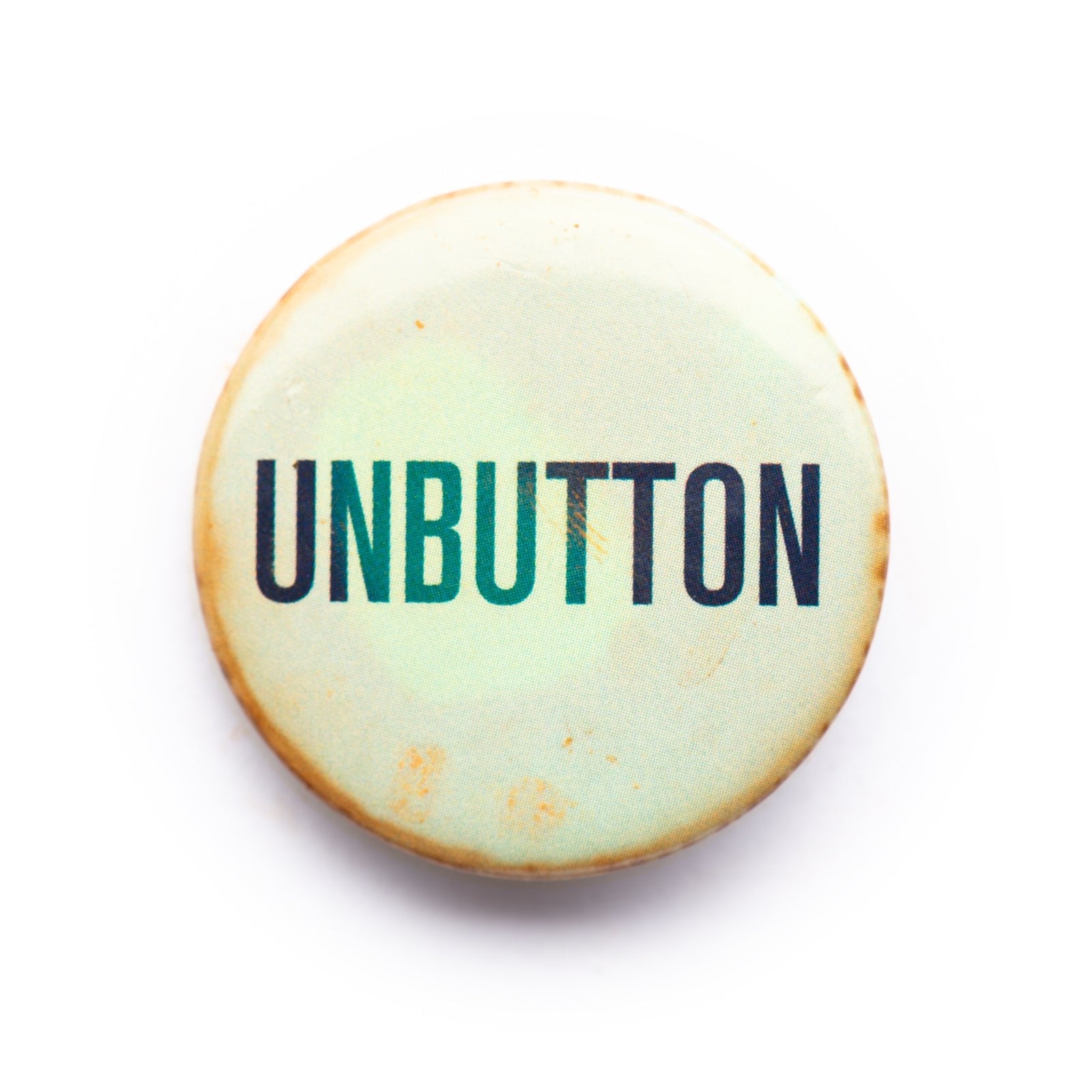 "Unbutton" button pin - RADICAL MEDIA ARCHIVE